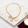 Collier stainless steel avec pendentif cœur doré