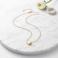 Collier stainless steel doré avec pendentif cœur